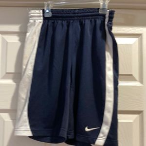 Nike dri fit polyester shorts, used size large in kids which is a teen size